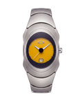 Aerostore Time Bomb in Matte Yellow — matte stainless steel Y2K watch with vibrant yellow Frutiger Aero dial, dark bezel and date window. Australian-made 2000s-inspired sculptural wristwatch in matte metal finish