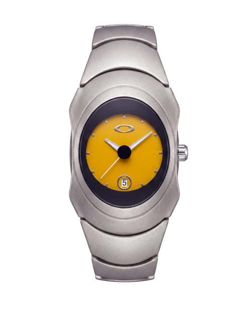Aerostore Time Bomb in Matte Yellow — matte stainless steel Y2K watch with vibrant yellow Frutiger Aero dial, dark bezel and date window. Australian-made 2000s-inspired sculptural wristwatch in matte metal finish